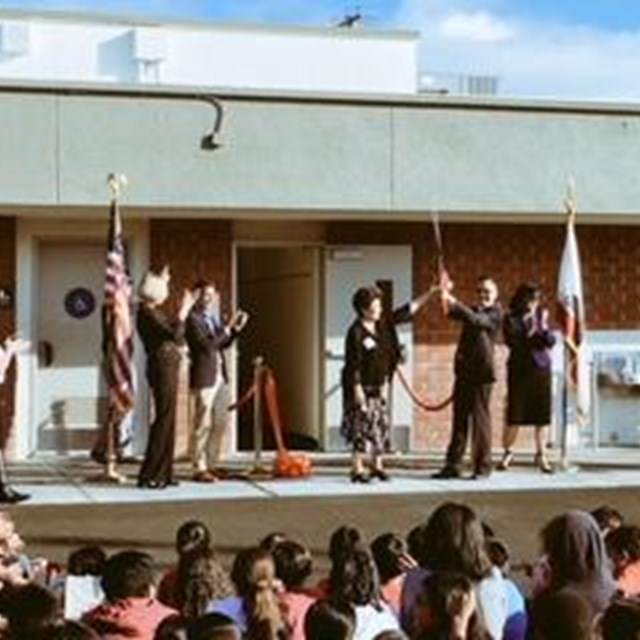Students join our district staff in a heartfelt assembly.
